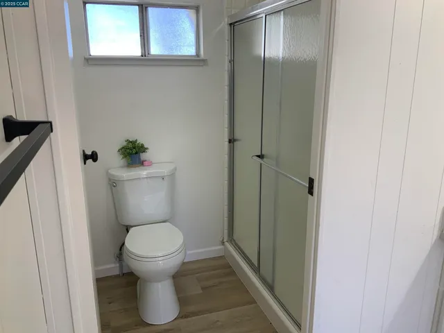 a bathroom with a toilet and a sink