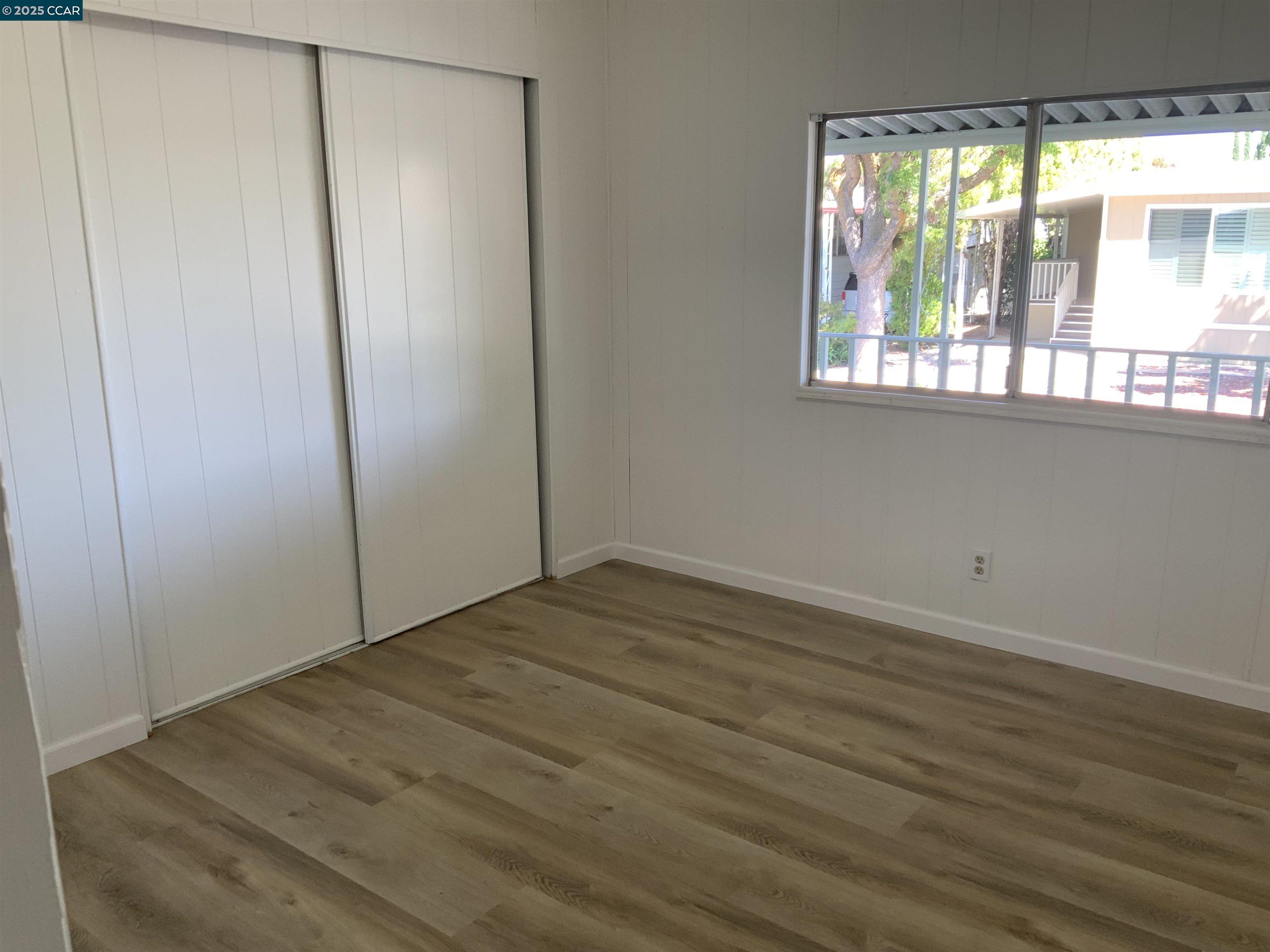 165 Tiki Lane Pittsburg, CA 94565 - Photo 26 of 28 a view of an empty room with a window
