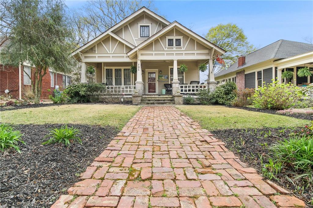 706 Elbert Street Southwest Atlanta, GA 30310 - Photo 1 of 1 a front view of a house with a yard