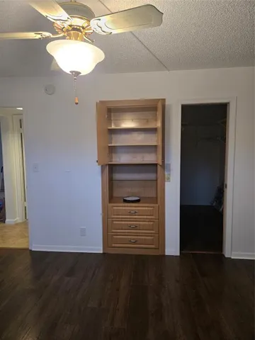 a kitchen with a refrigerator stove and microwave