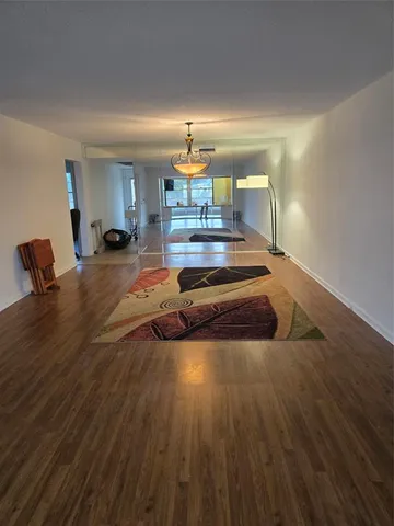 a living room with wooden floor