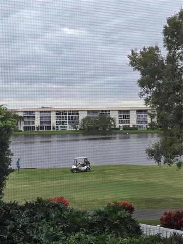 a view of a house with a swimming pool