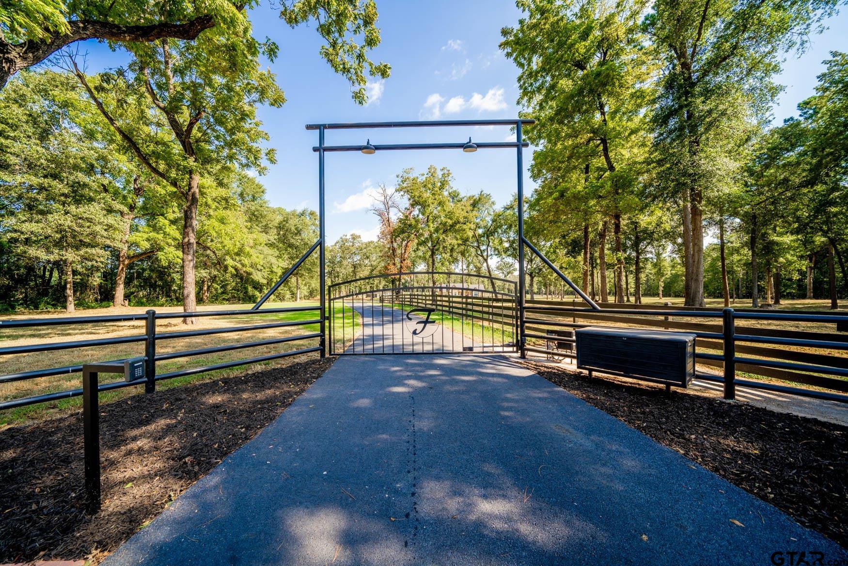 343 Driskell Bridge Road Harleton, TX 75651 - Photo 2 of 42 a view of outdoor space with deck and garden