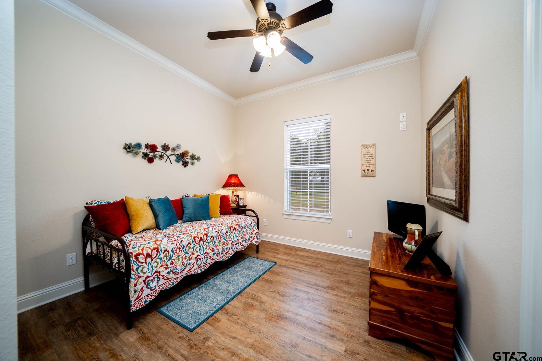 343 Driskell Bridge Road Harleton, TX 75651 - Photo 23 of 42 a living room with furniture and a window