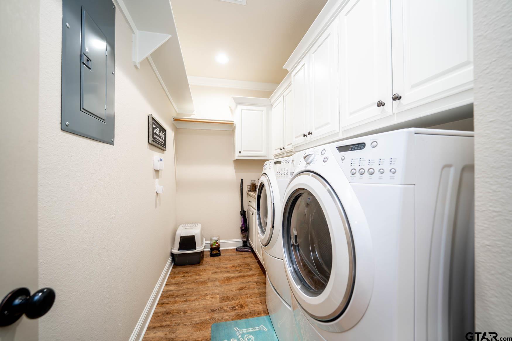 343 Driskell Bridge Road Harleton, TX 75651 - Photo 25 of 42 a utility room with dryer and washer