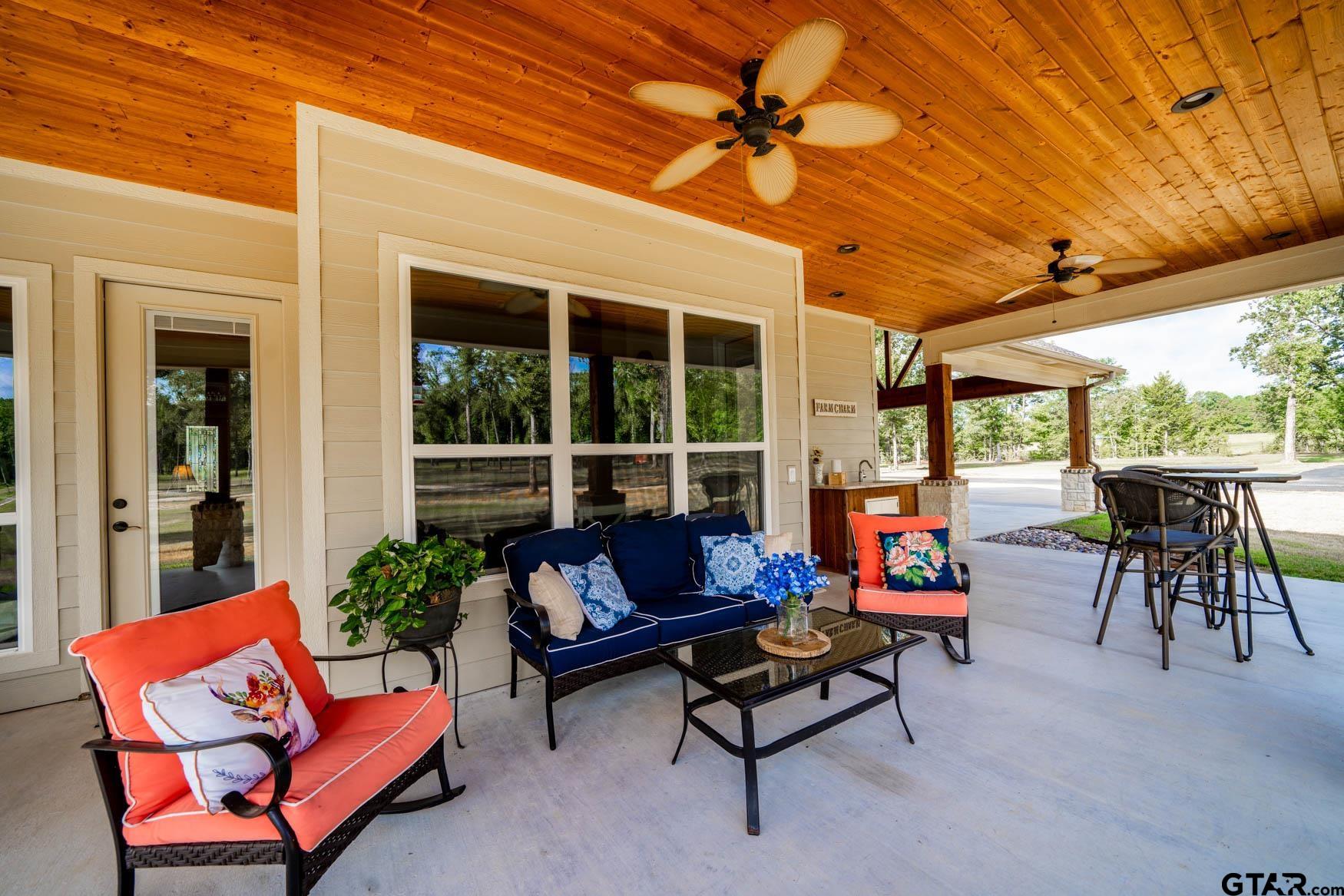 343 Driskell Bridge Road Harleton, TX 75651 - Photo 28 of 42 a building outdoor space with patio furniture and potted plants