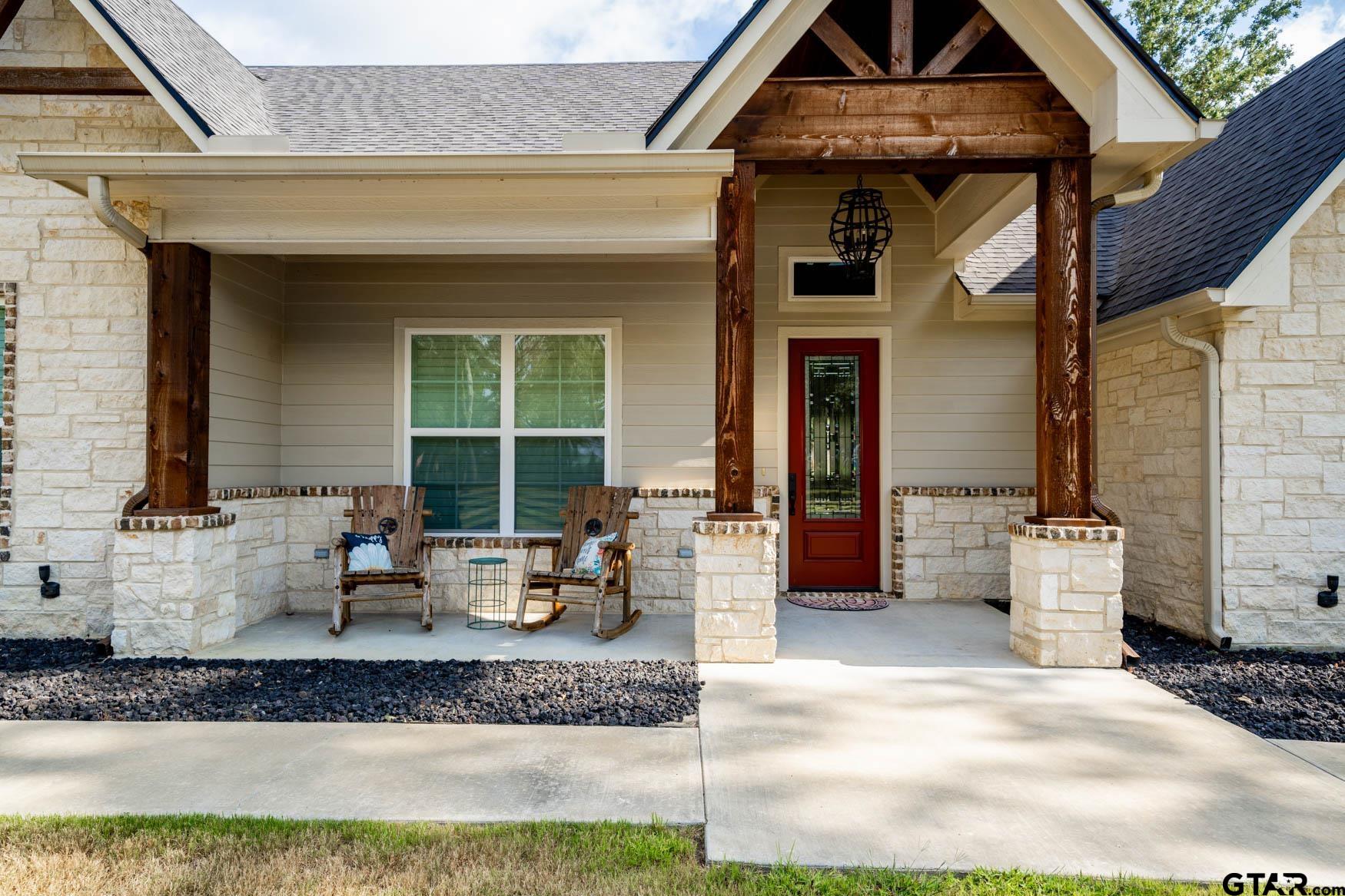 343 Driskell Bridge Road Harleton, TX 75651 - Photo 5 of 42 a building outdoor space with patio furniture