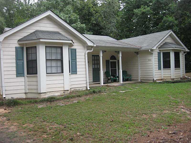 Exterior Front. Lovely ranch with bay windows.