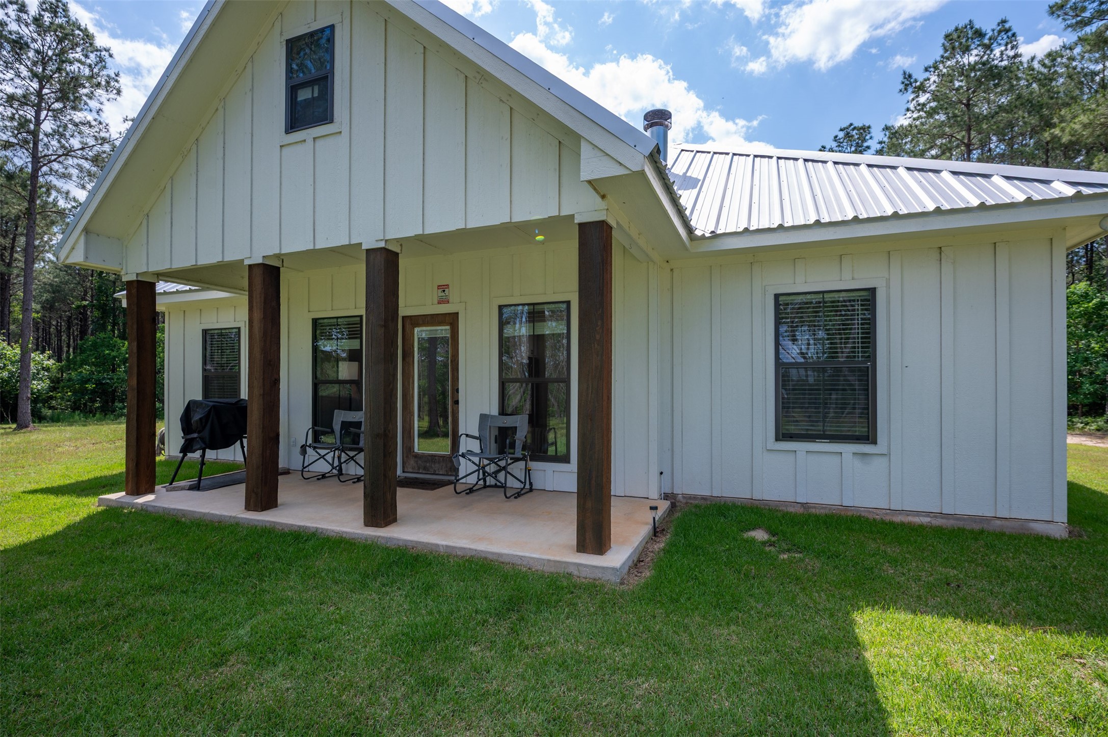 1068 County Road 3200 Colmesneil, TX 75938 - Photo 4 of 43 a view of an house with backyard porch and furniture
