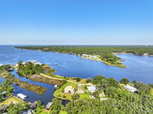 view of a lake with outside a yard