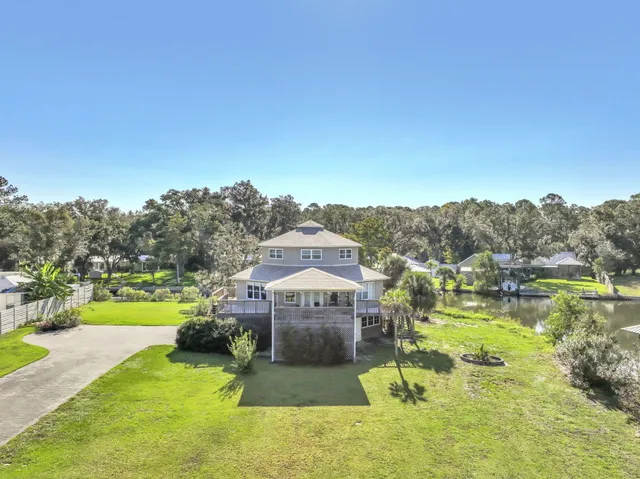 a balcony with swimming pool and green space
