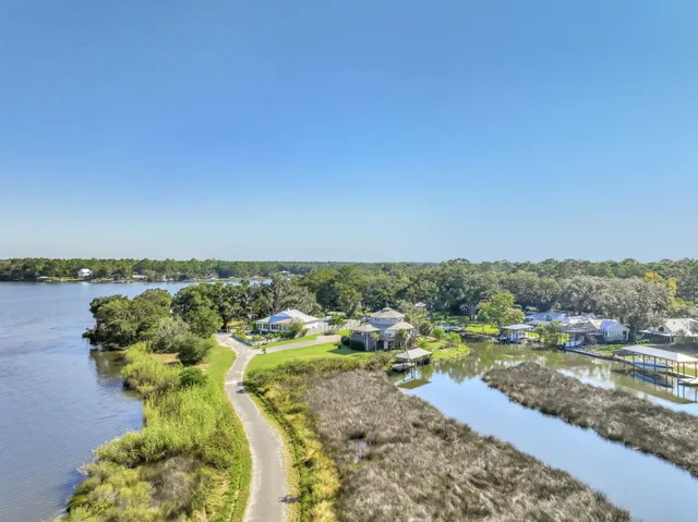 an aerial view of houses and a yard