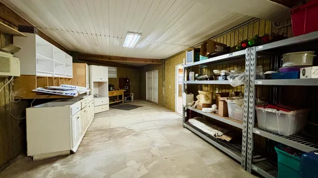 a kitchen with a stove and a refrigerator