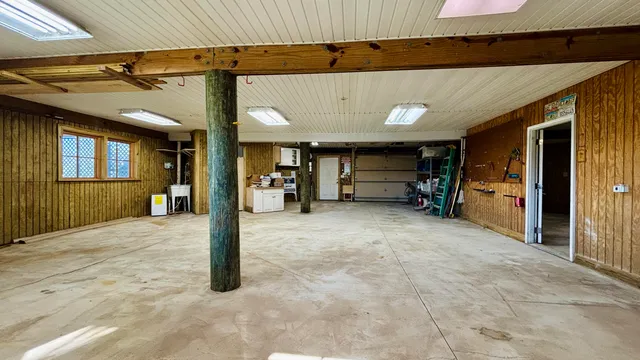 a view of an empty room with closet