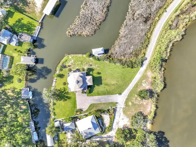 a view of swimming pool with a table and chairs