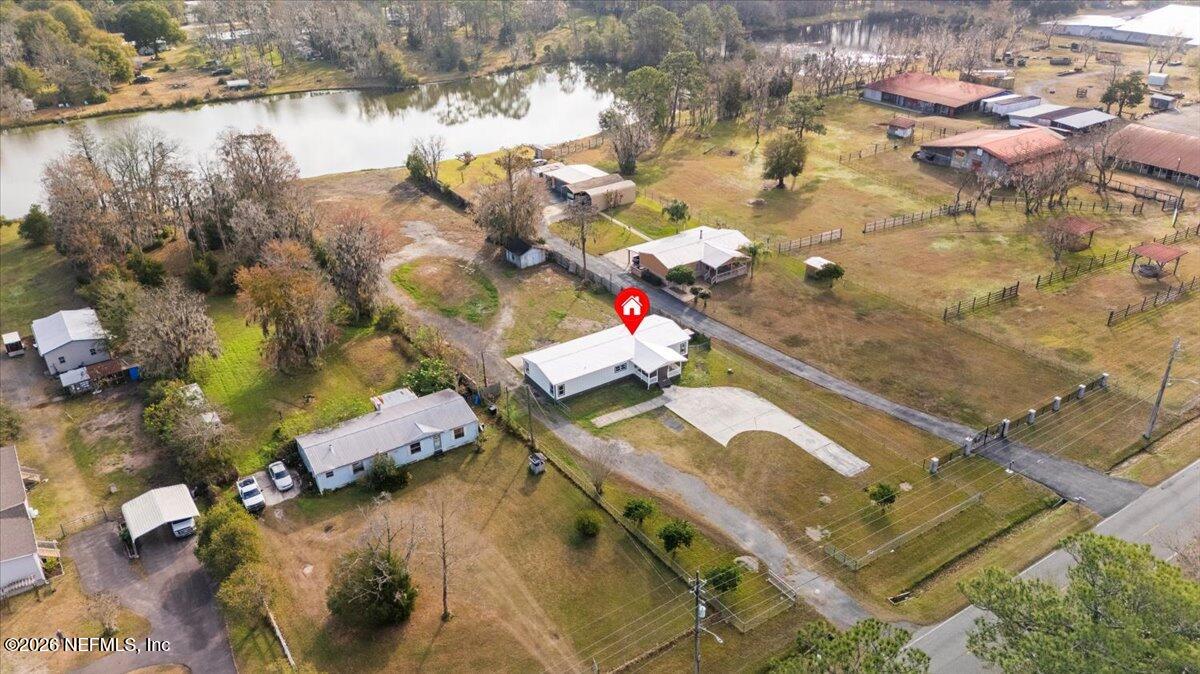 345 Jones Road Jacksonville, FL 32220 - Photo 2 of 32 an aerial view of a house with a yard