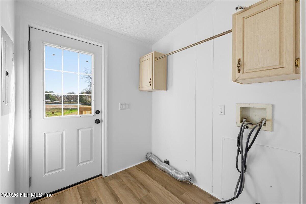 345 Jones Road Jacksonville, FL 32220 - Photo 28 of 32 a view of a room with rack on the wall