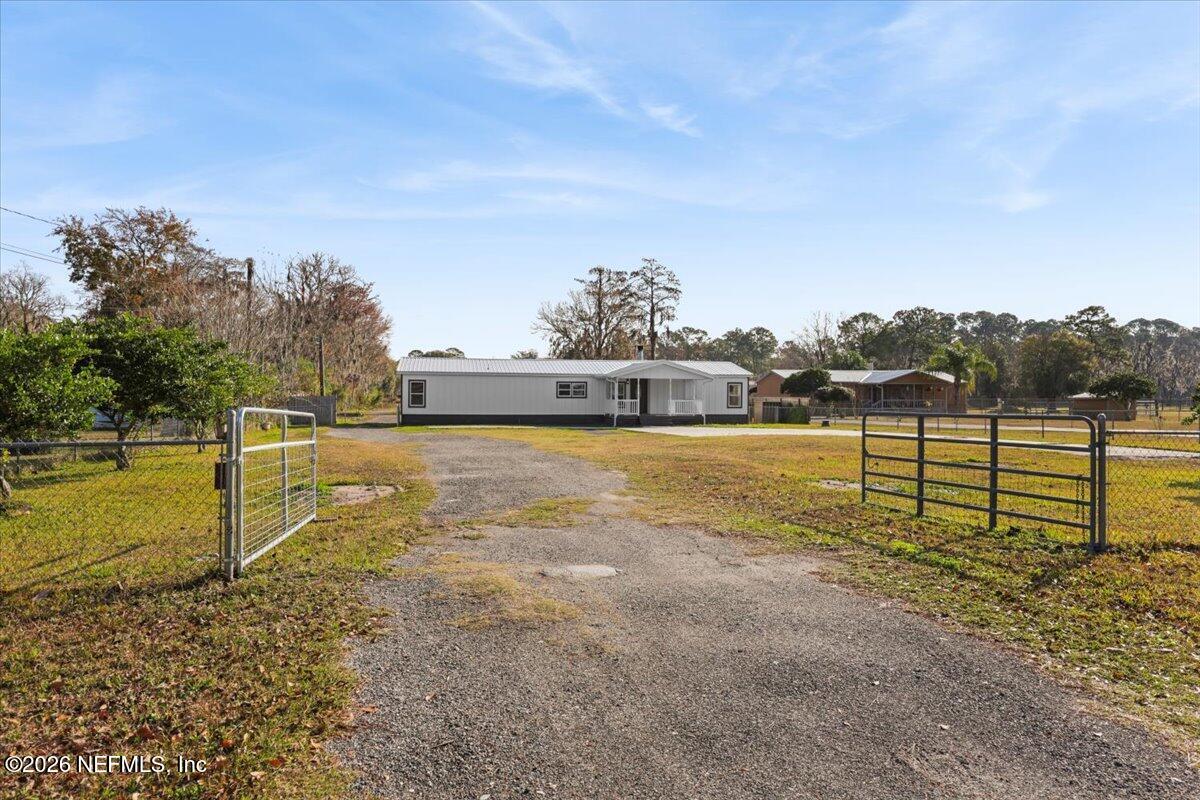 345 Jones Road Jacksonville, FL 32220 - Photo 6 of 32 a view of a lake with houses