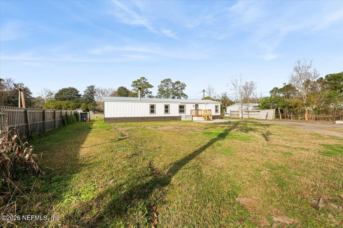 345 Jones Road Jacksonville, FL 32220 - Photo 7 of 32 a view of a swimming pool with an ocean view