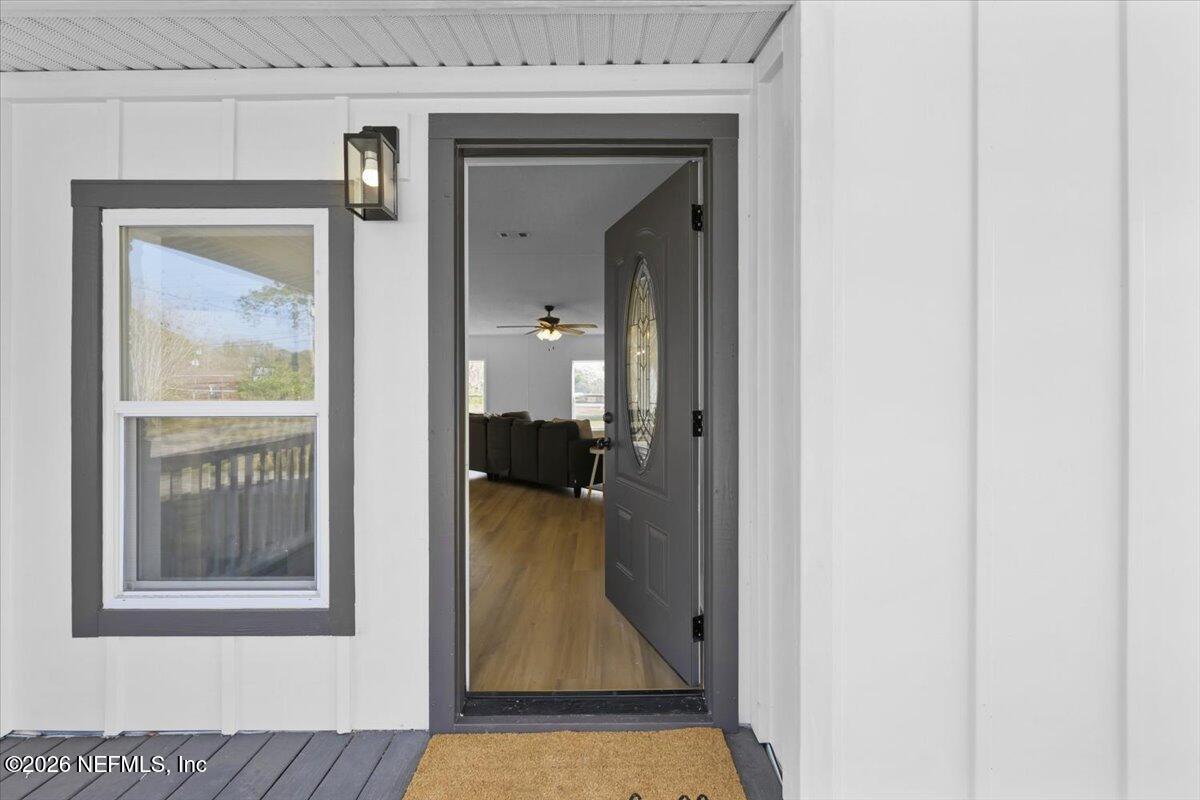 345 Jones Road Jacksonville, FL 32220 - Photo 8 of 32 a view of a bedroom from a hallway