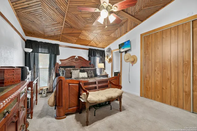 a dining room with furniture and chandelier