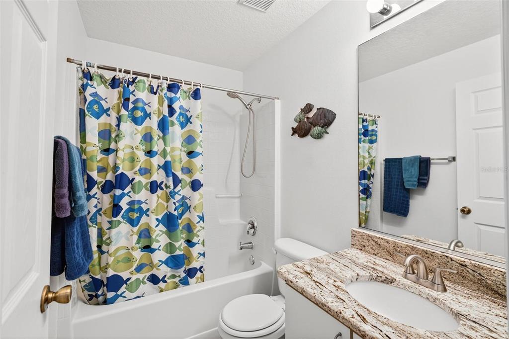 3859 Southwest 109th Lane Ocala, FL 34476 - Photo 27 of 55 a bathroom with a sink toilet and shower