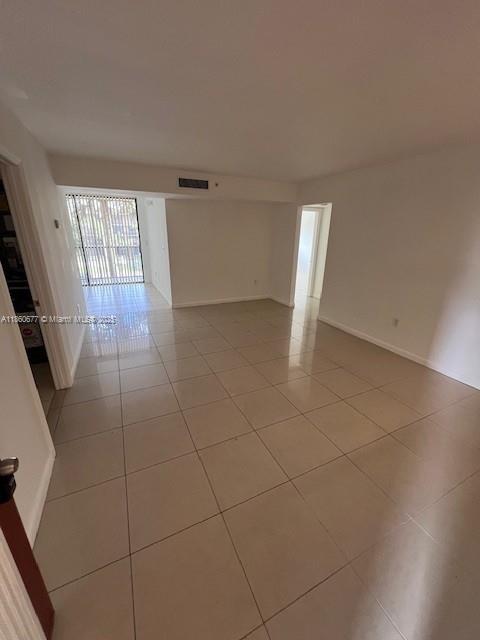 8700 Southwest 133rd Avenue Road, Unit 314 Miami, FL 33183 - Photo 2 of 18 a view of an empty room with a window