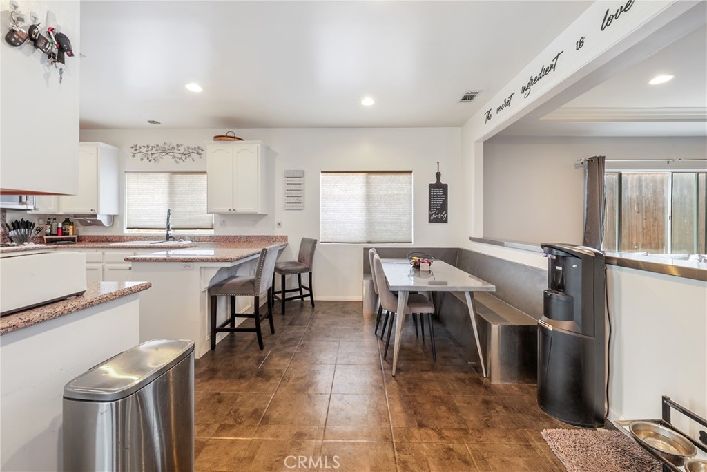1842 Balboa Way Upland, CA 91784 - Photo 14 of 70 a view of a dining room with furniture