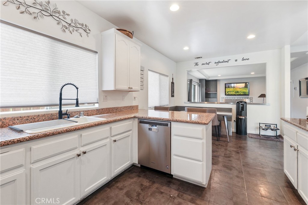 1842 Balboa Way Upland, CA 91784 - Photo 18 of 70 a kitchen with counter top space sink and cabinets