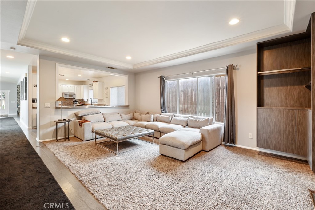1842 Balboa Way Upland, CA 91784 - Photo 20 of 70 a living room with furniture and a large window