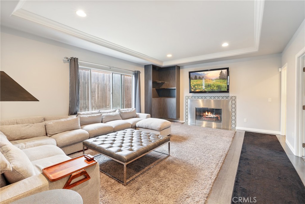 1842 Balboa Way Upland, CA 91784 - Photo 21 of 70 a living room with furniture and a flat screen tv