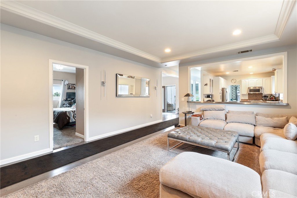 1842 Balboa Way Upland, CA 91784 - Photo 22 of 70 a living room with furniture and a wooden floor