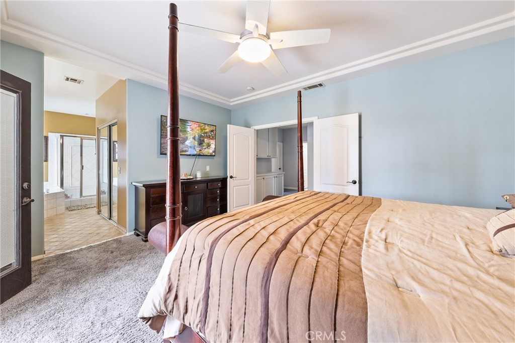 1842 Balboa Way Upland, CA 91784 - Photo 30 of 70 a bed room with a bed and a large mirror