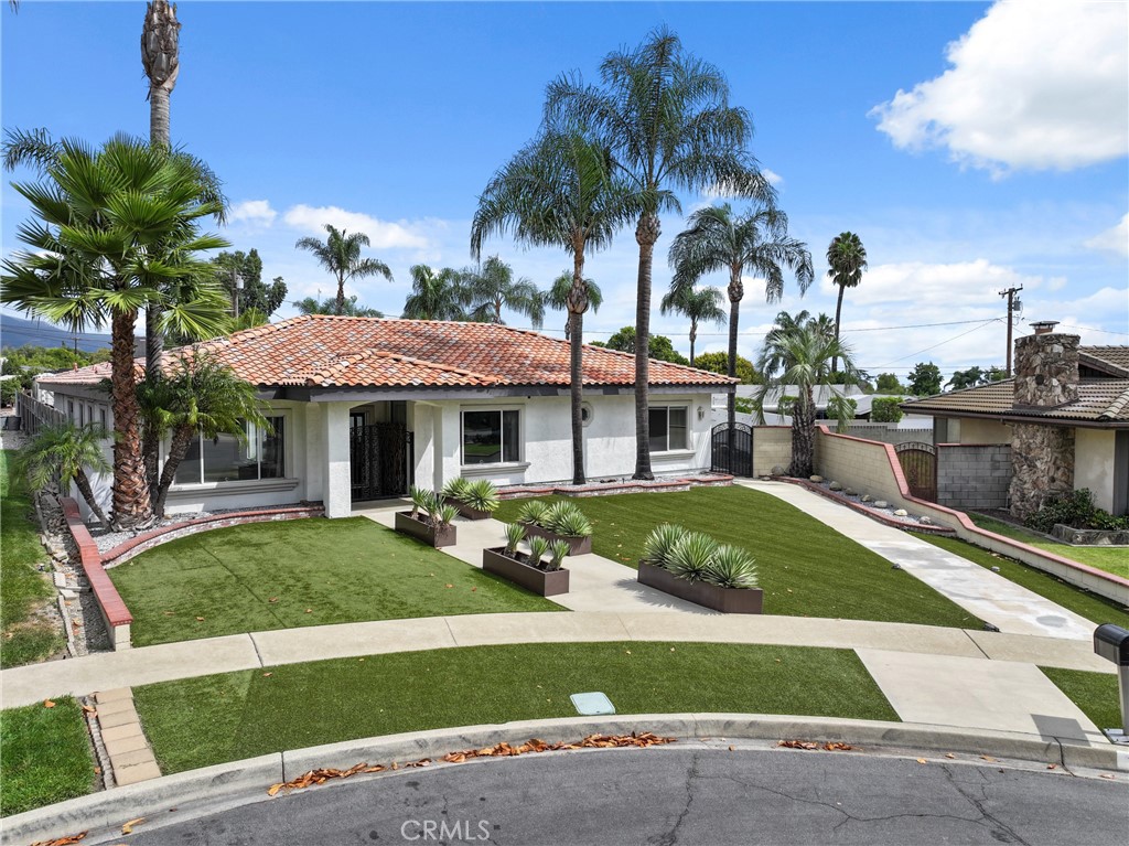 1842 Balboa Way Upland, CA 91784 - Photo 3 of 70 a view of a house with garden and a sitting area