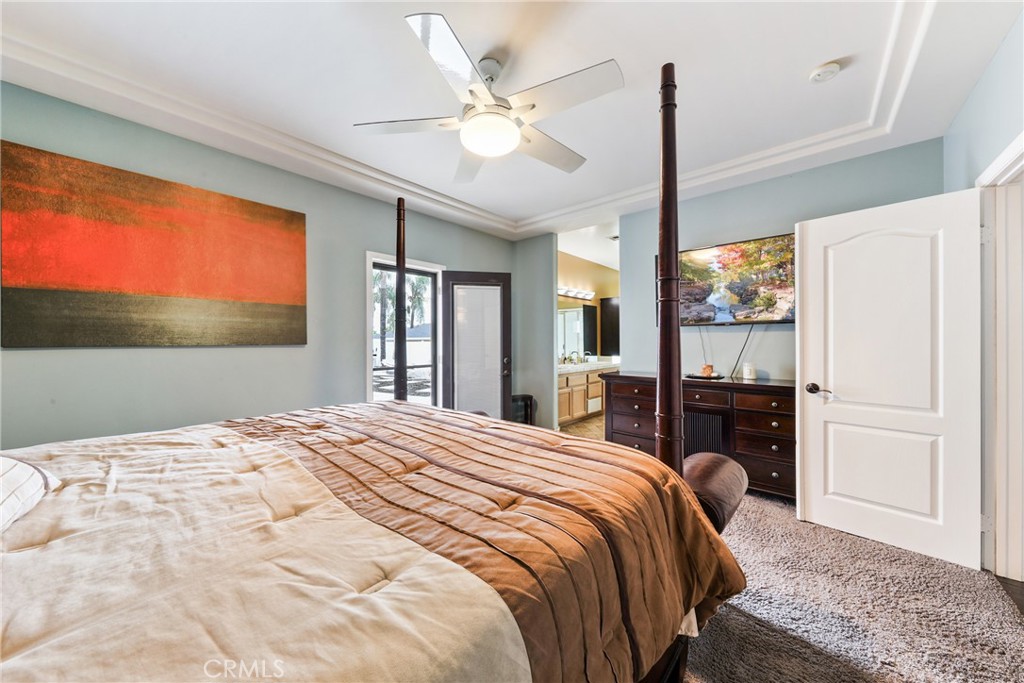 1842 Balboa Way Upland, CA 91784 - Photo 31 of 70 a bedroom with a large bed and a large window