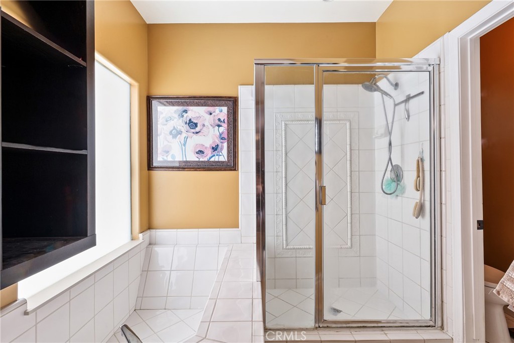 1842 Balboa Way Upland, CA 91784 - Photo 33 of 70 a bathroom with a shower and a sink