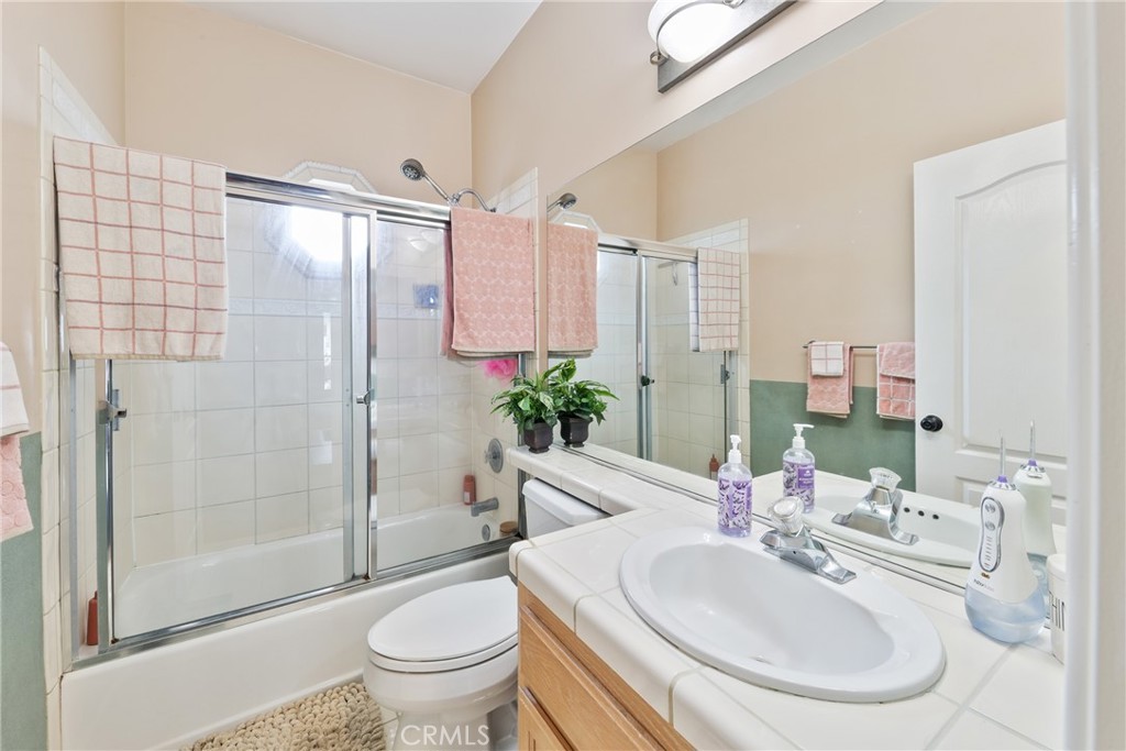 1842 Balboa Way Upland, CA 91784 - Photo 34 of 70 a bathroom with a sink toilet and shower