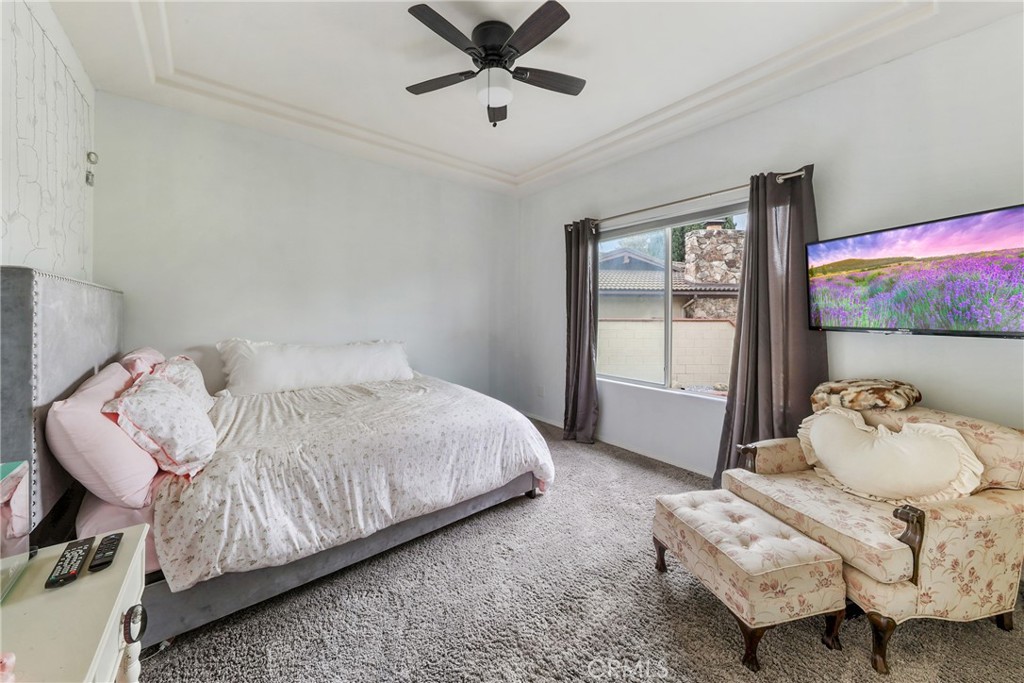 1842 Balboa Way Upland, CA 91784 - Photo 39 of 70 a bedroom with a bed and window