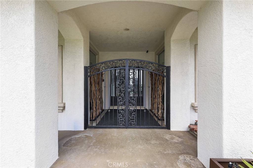 1842 Balboa Way Upland, CA 91784 - Photo 4 of 70 a view of a hallway with wooden floor and a living room