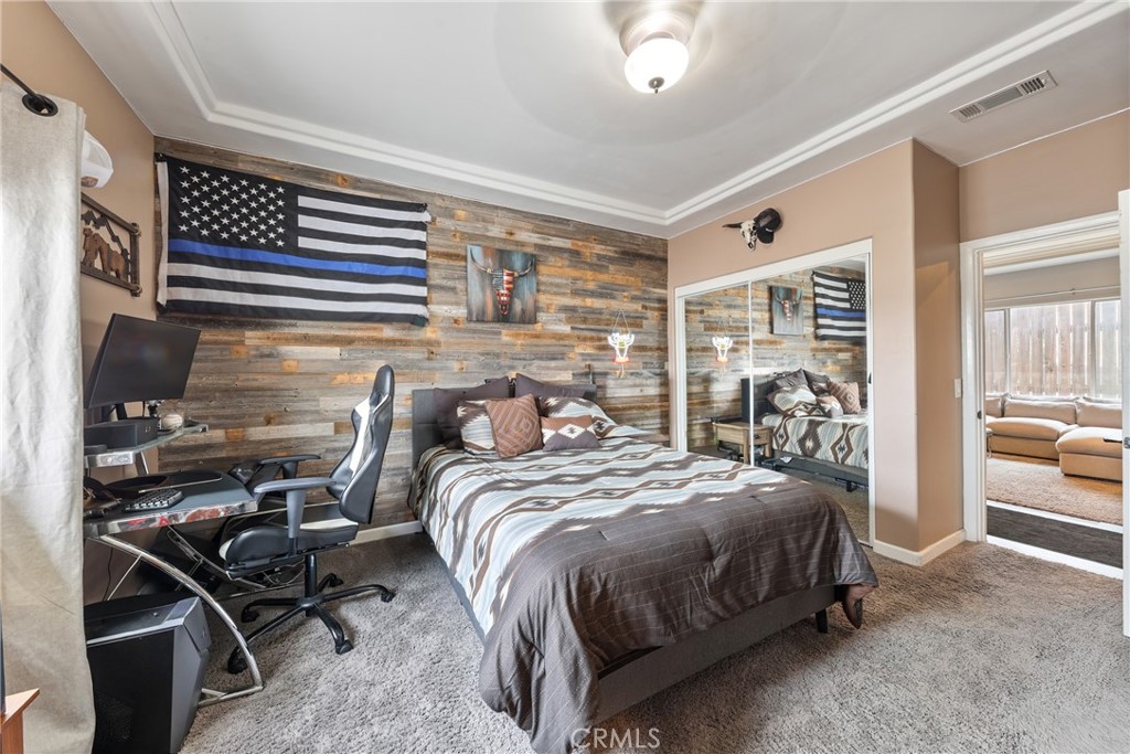 1842 Balboa Way Upland, CA 91784 - Photo 41 of 70 a bedroom with a bed a table and chair