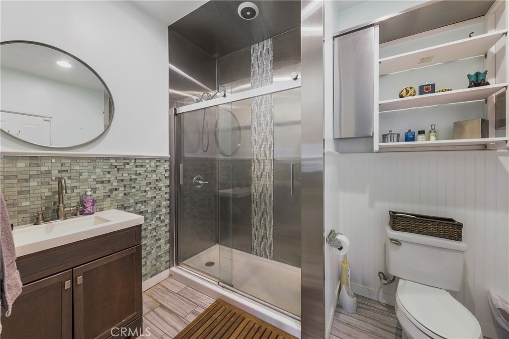 1842 Balboa Way Upland, CA 91784 - Photo 43 of 70 a bathroom with a sink a toilet and shower