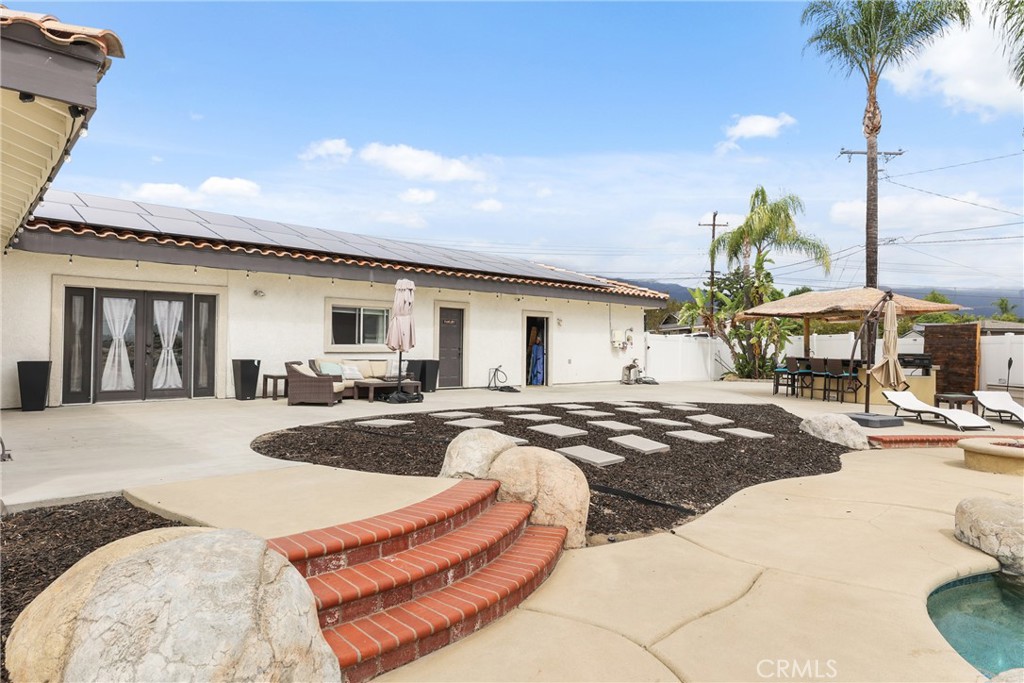 1842 Balboa Way Upland, CA 91784 - Photo 50 of 70 a view of a house with swimming pool and sitting area