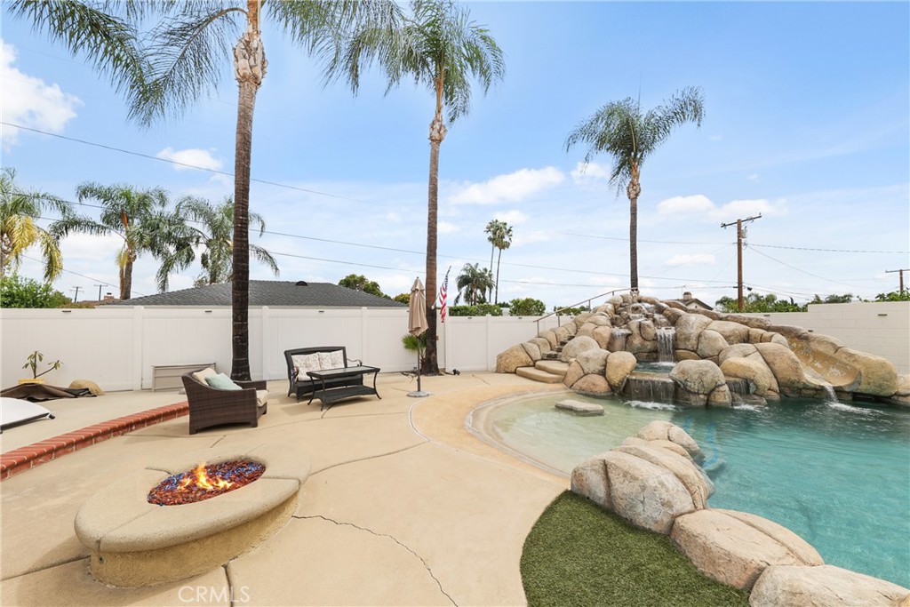 1842 Balboa Way Upland, CA 91784 - Photo 52 of 70 a view of swimming pool with a table and chairs