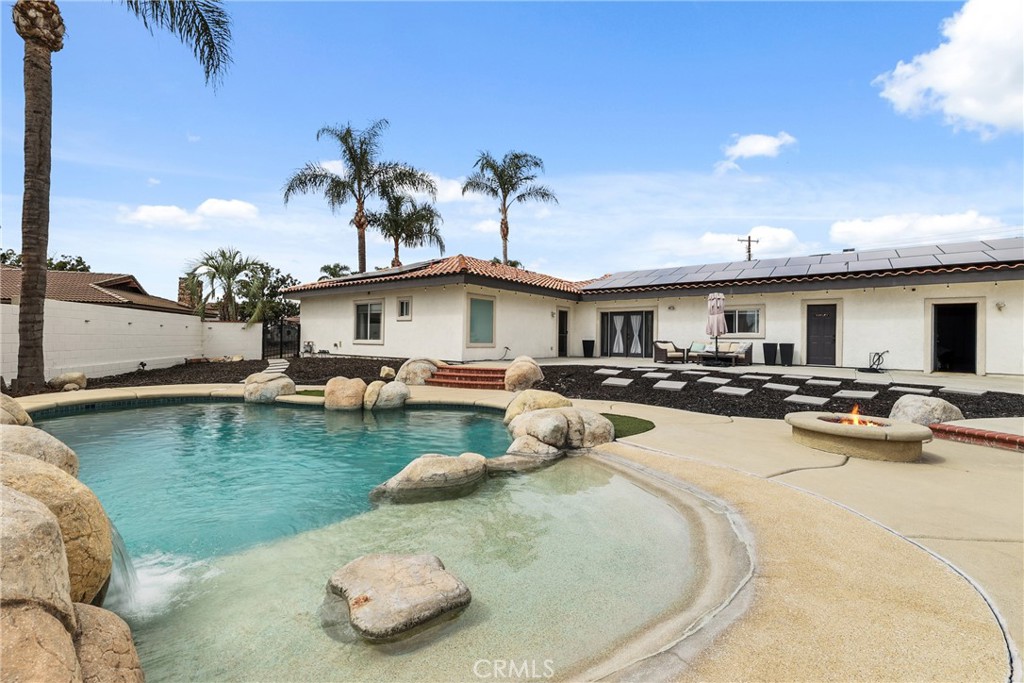 1842 Balboa Way Upland, CA 91784 - Photo 54 of 70 a view of a swimming pool with outdoor seating
