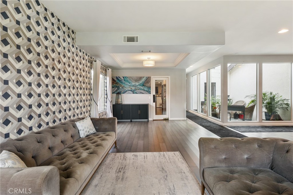 1842 Balboa Way Upland, CA 91784 - Photo 10 of 70 a living room with furniture and a fireplace