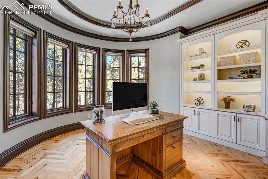4602 High Forest Road Colorado Springs, CO 80908 - Photo 18 of 50 a dining table chair next to a window