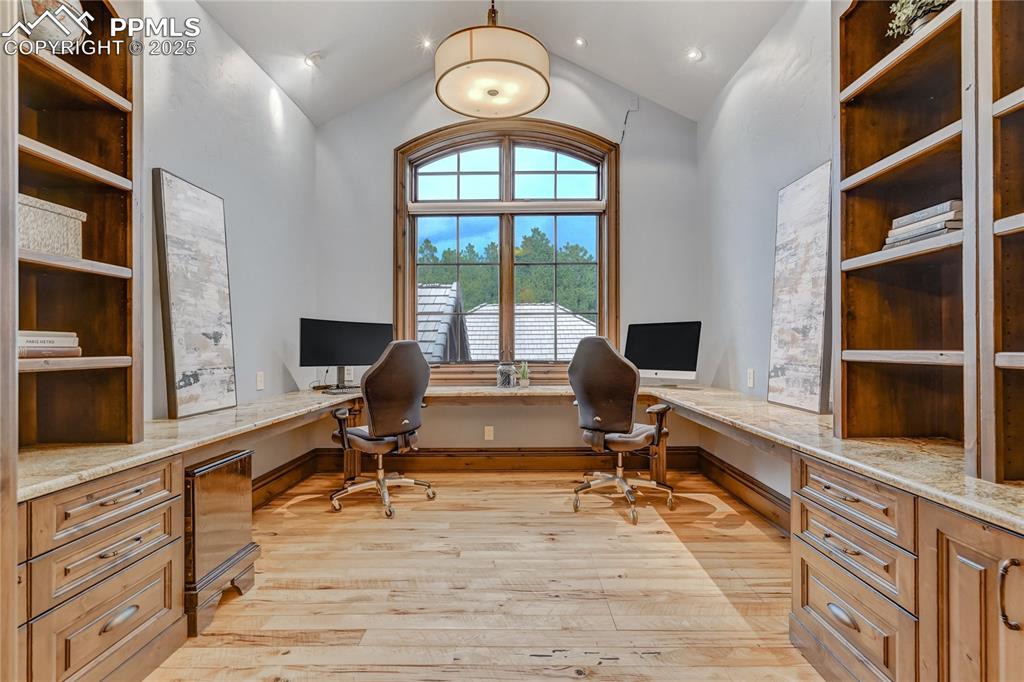 4602 High Forest Road Colorado Springs, CO 80908 - Photo 27 of 50 a view of a livingroom with workspace and a window