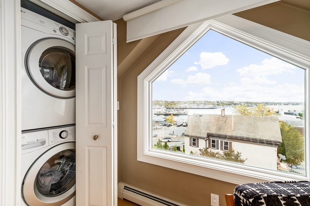 160 Prospect Street, Unit 3 Gloucester, MA 01930 - Photo 13 of 22 a view of a house with a ocean view