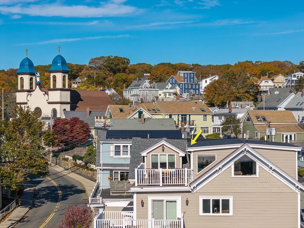 160 Prospect Street, Unit 3 Gloucester, MA 01930 - Photo 18 of 22 a view of a city with tall buildings
