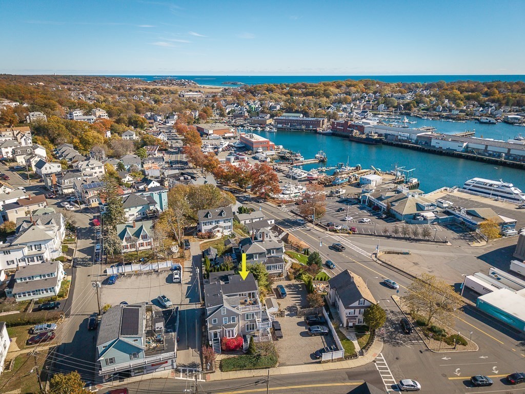 160 Prospect Street, Unit 3 Gloucester, MA 01930 - Photo 20 of 22 an aerial view of ocean and residential houses with outdoor space